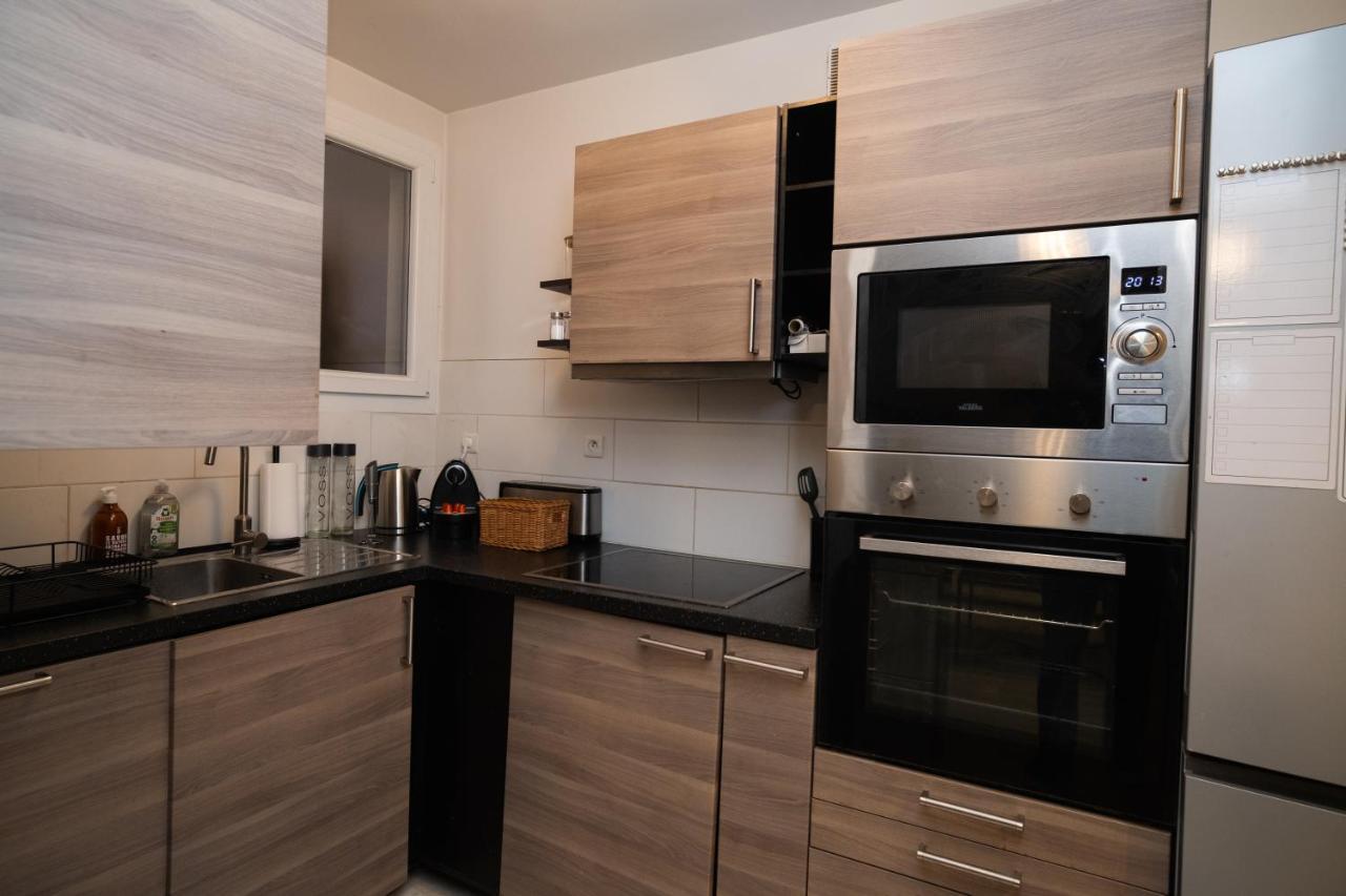 Joli T2 Proche Du Metro Avec Vue Tour Eiffel Apartment อิซซีเลมูลิโนต์ ภายนอก รูปภาพ
